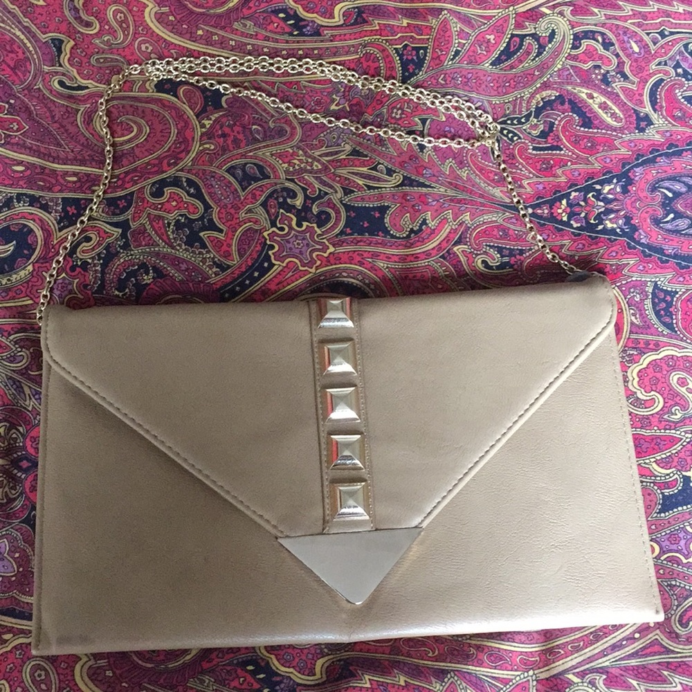 Tan clutch with metal chain